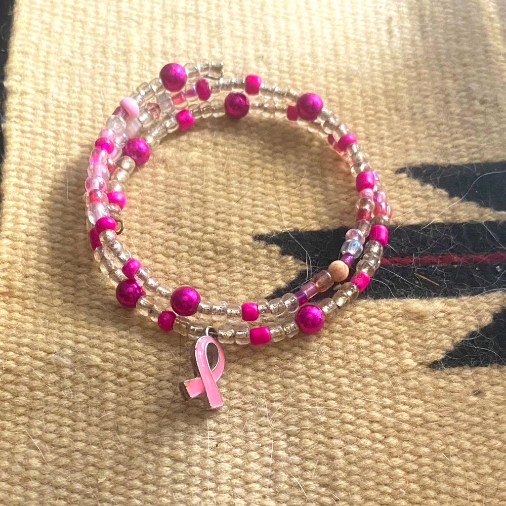 3/$15.  Pink Beaded Bracelet with Breast Cancer Awareness Charm